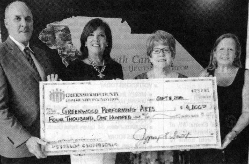 The Greenwood County Community Foundation recently awarded a $4,100 grant to Greenwood Performing Arts (GPA) in support of its outreach performances for Greenwood students and seniors, offered by professional artists throughout the GPA season. The first outreach performance will be by Melinda Doolittle, vocalist, on Oct. 7. For more information, call 864-227-8744. From left are Jeff Smith, GCCF president; Lisa Sanders, GPA board president; Cecily Ferguson, GPA executive director; and Mary Woodiwiss, GCCF projects and grants manager.